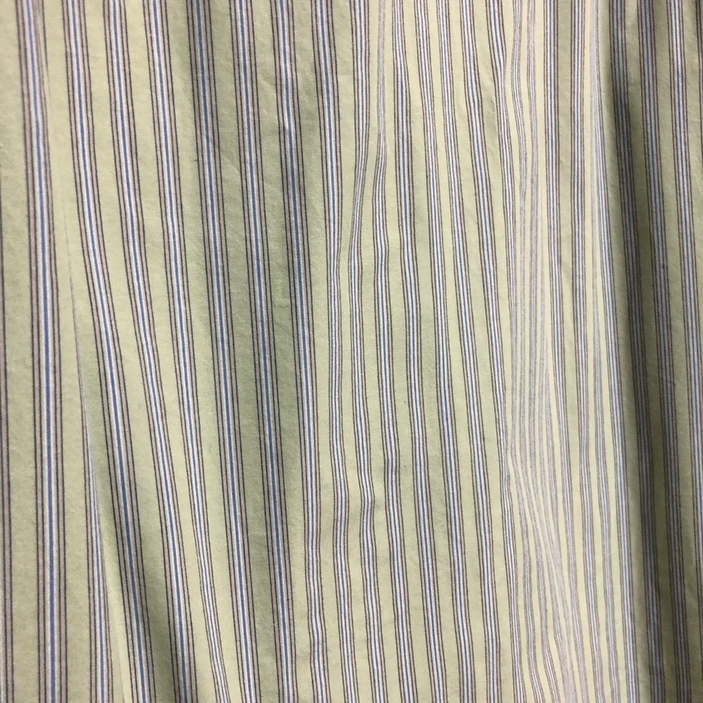 Izod. large green shirt with beige white and blue stripes has pocket